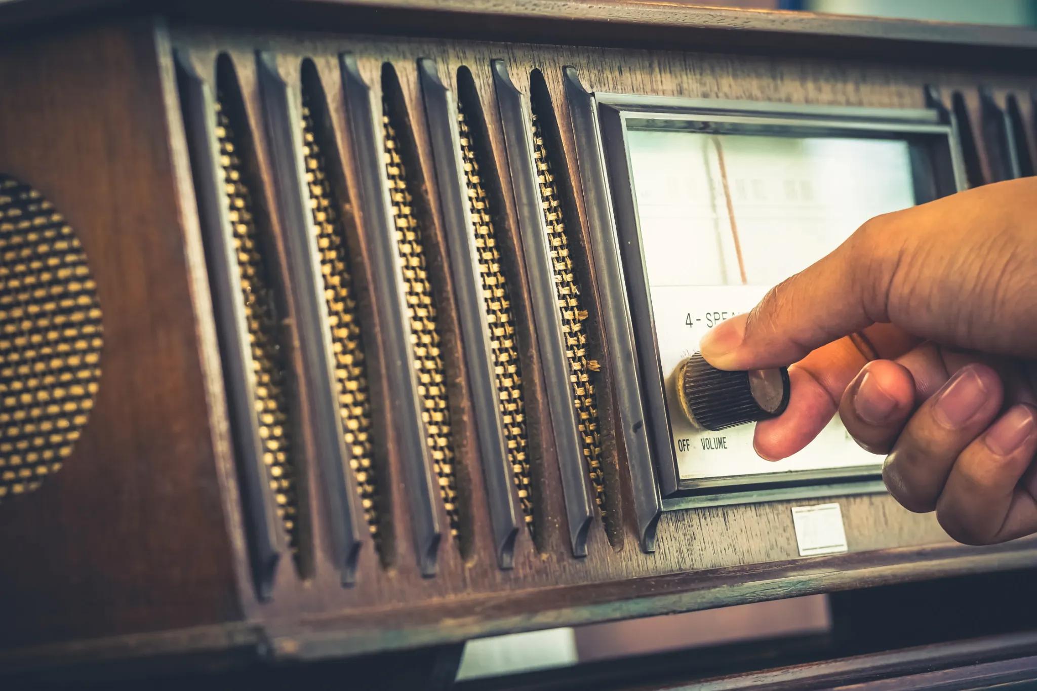 Hand tuning a vintage radio
